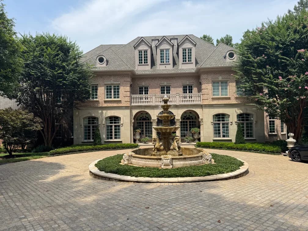 Exterior of the Great Falls mansion associated with this downsizing auction